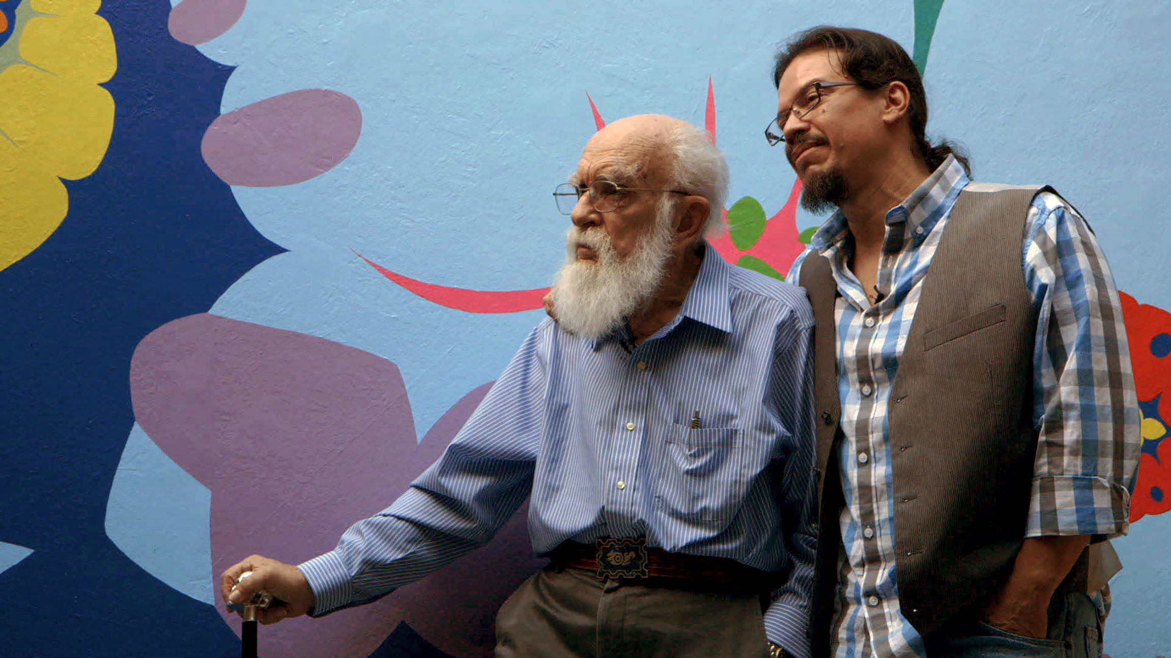 James Randi and his partner Jose Alvarez pose for An Honest Liar.