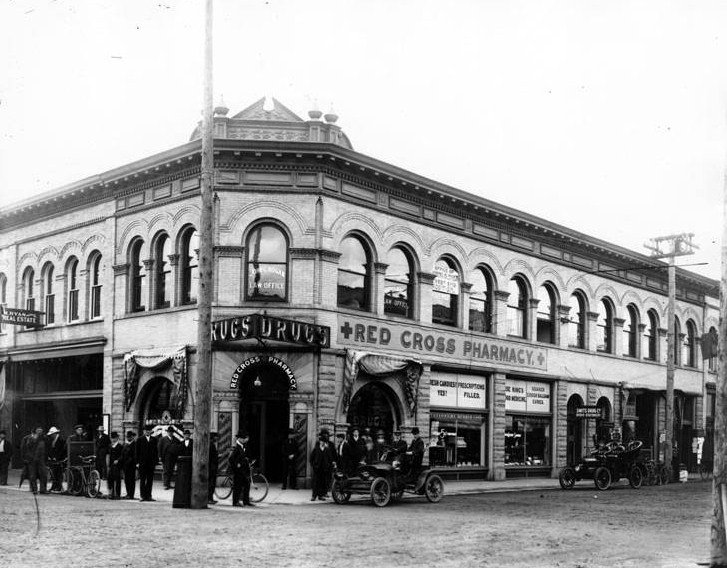Heron Street from the direction of F Street as it looked in 1908 clearly shows this building was predominantly occupied by a drug store.