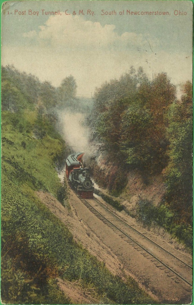 A postcard view of a train emerging from Post Boy Tunnel.
